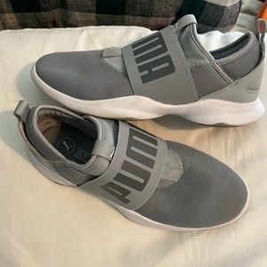 Grey and white slip on Puma sneakers